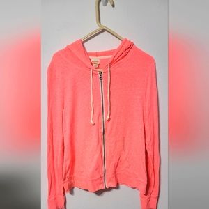 Large, pink, zip up sweater